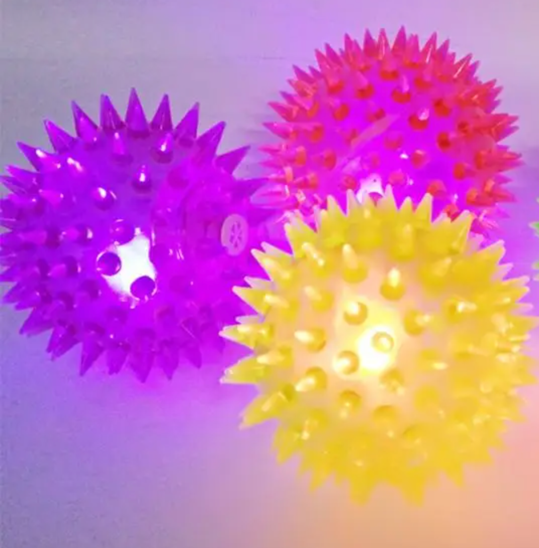 Bola Spike Sensoryland – Estímulo Sensorial com Reação à Luz Negra